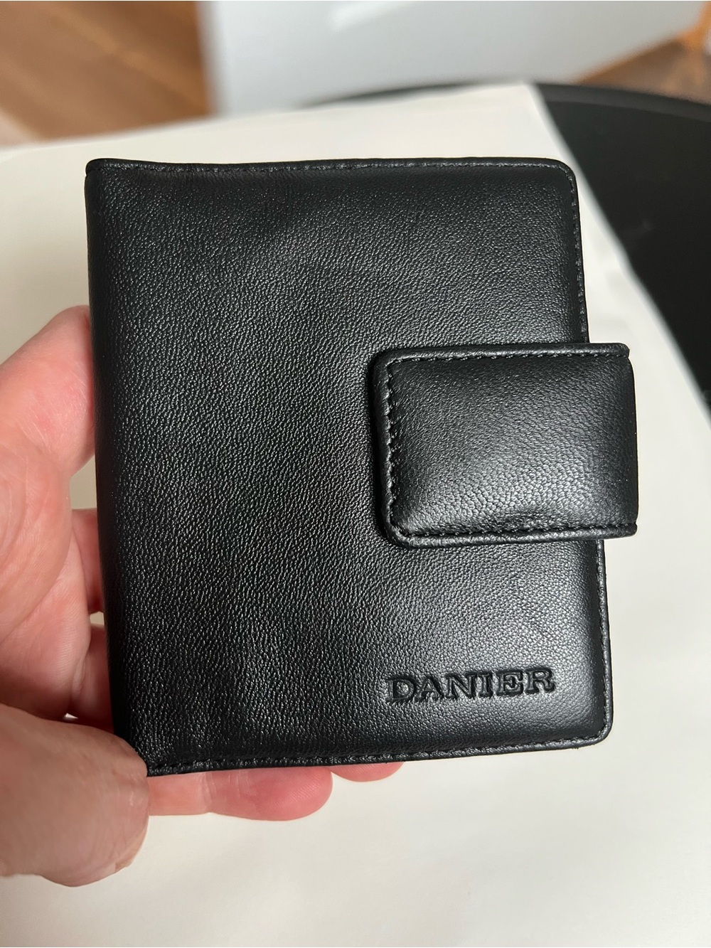 Danier Genuine Leather Black Bifold Wallet with ID Window & Snap Closure